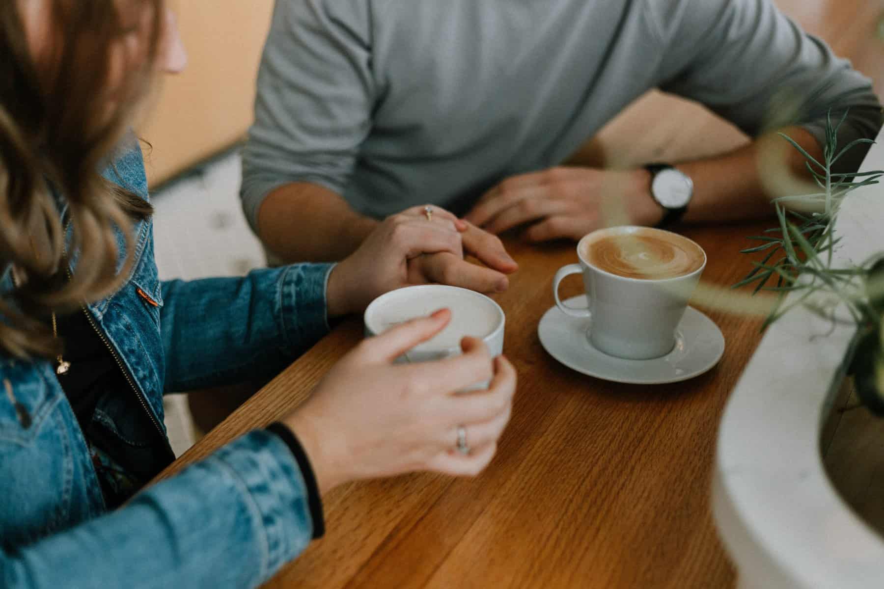 Couple enjoying time together over coffee. How to help your partner with porn addiction